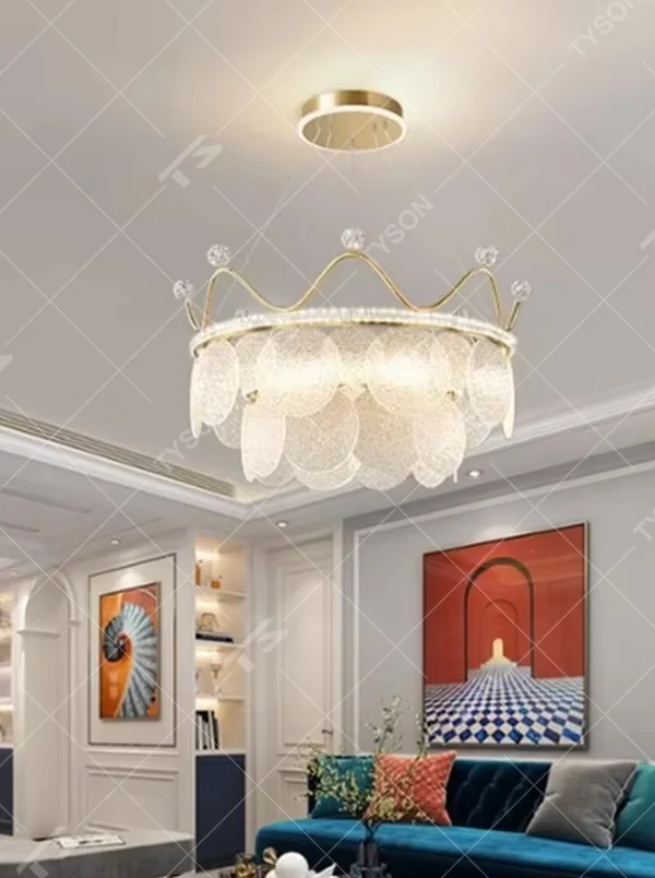 A light luxury princess-style crown-shaped chandelier, featuring a gold metal crown frame paired with crystal decorations and glowing glass lampshades. It emits a brilliant yet soft glow when lit, combining decorative appeal with practical illumination, ideal for creating a romantic and dreamy space atmosphere.