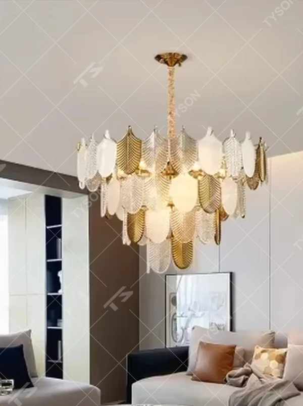This modern light luxury leaf art chandelier is composed of gold and transparent leaf-shaped ornaments arranged in staggered layers, presenting a light and elegant shape like spreading feathers. Light refracts through the ornaments to emit a soft and transparent halo, serving both lighting and decorative purposes, suitable for modern light luxury style spaces such as living rooms and dining rooms.