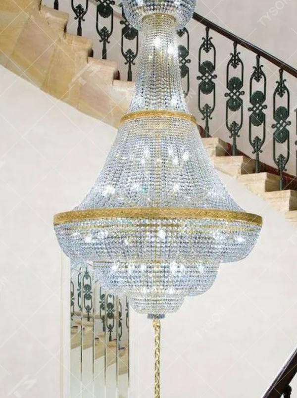 This European court-style golden goblet vase multi-layer crystal chandelier features a gold metal frame paired with dense high-transparency crystals, forming a multi-layer tower structure in the shape of a vase, with brilliant and luxurious light, serving both lighting and decorative purposes, suitable for high-end high-ceiling spaces such as villa high-ceiling staircases and hotel lobbies.