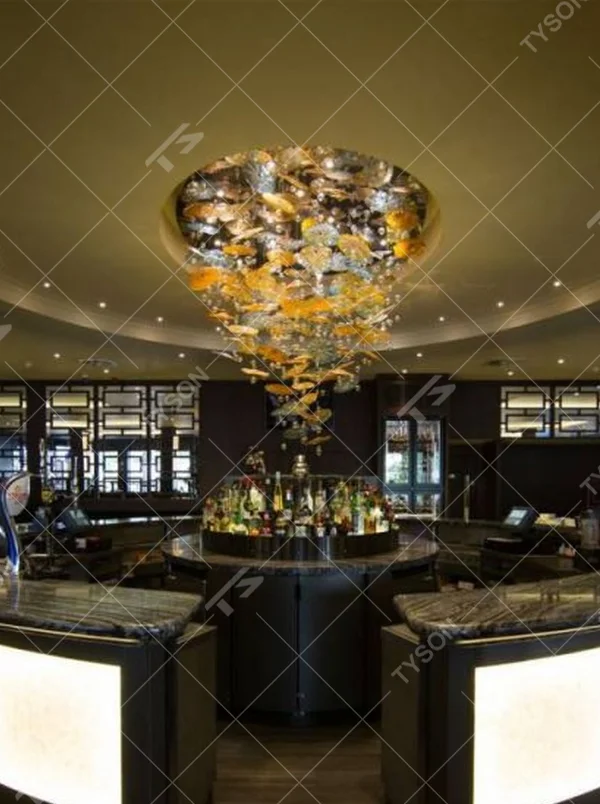 Modern artistic waterfall-style gradient glass chandelier, with gold-brown gradient glass particles creating an irregular cloud hanging shape, combining decorative and main lighting functions, suitable for high-end restaurants, clubs, hotel bars and other light luxury style spaces.
