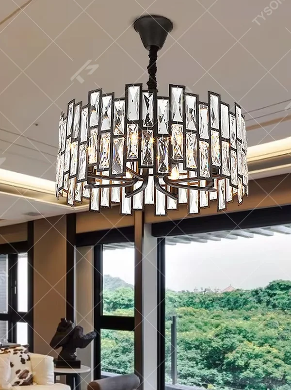 This modern light luxury square crystal chandelier features a black metal frame, inlaid with multi-faceted cut crystal pieces to form a square shape. When lit, light refracts through the crystal to emit a brilliant and luxurious glow, combining a bold texture with an elegant ambiance. Ideal for living rooms, dining rooms, large apartments, and other spaces, it adds an exquisite and sophisticated touch to modern minimalist or light luxury home environments.