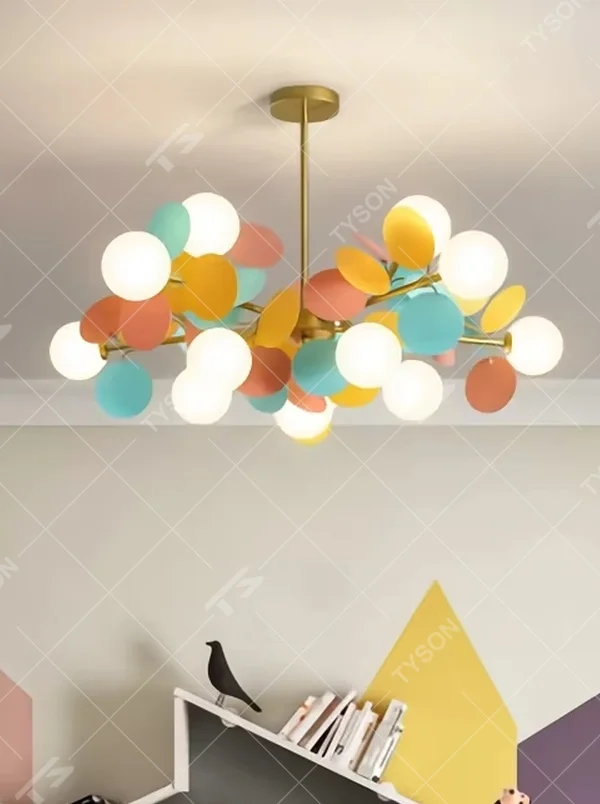 This playful and colorful disc chandelier features a gold metal frame, paired with milky white glowing spheres and macaron-colored (pink, orange, blue, yellow) decorative discs arranged in a staggered layout. When lit, it emits a soft and warm glow, creating a lively and comforting atmosphere. Ideal for kids' bedrooms, parent-child play areas, kindergartens, and other spaces, it adds a dreamy and romantic touch to childlike environments.