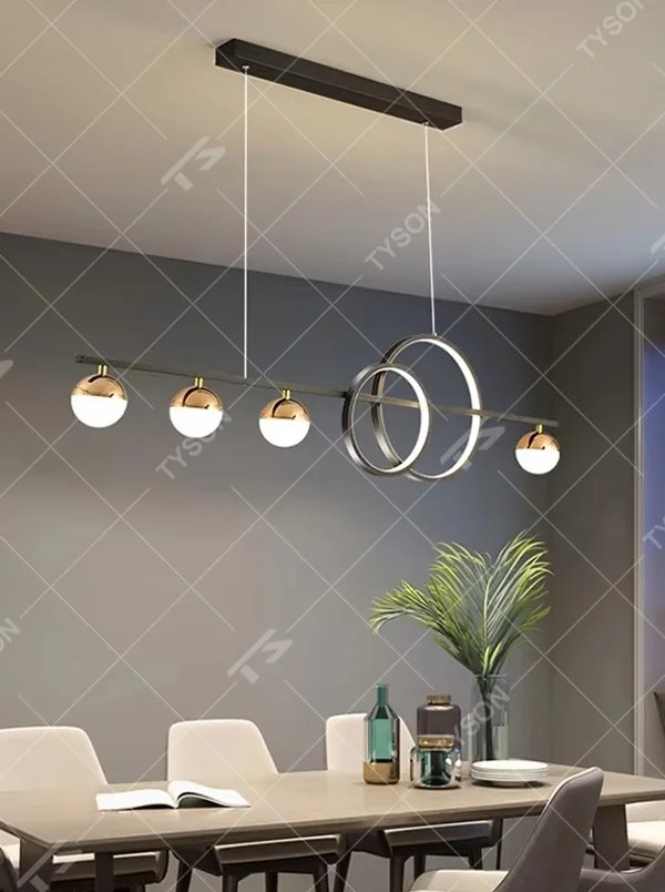 Modern light luxury black and gold combination linear chandelier, featuring a black metal frame paired with milk-white glass ball lampshades and double-ring decorations. Its minimalist and layered design combines style and ambiance, making it a decorative lighting fixture that elevates the space's aesthetic.