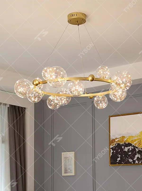 Modern light luxury starry sky ring chandelier, featuring a brass metal ring frame paired with transparent bubble glass balls with built-in lamp beads to form a star cluster shape. It emits bright and translucent light, combining a dreamy feel and elegant ambiance, making it a high-end decorative lighting fixture that elevates the space's style.