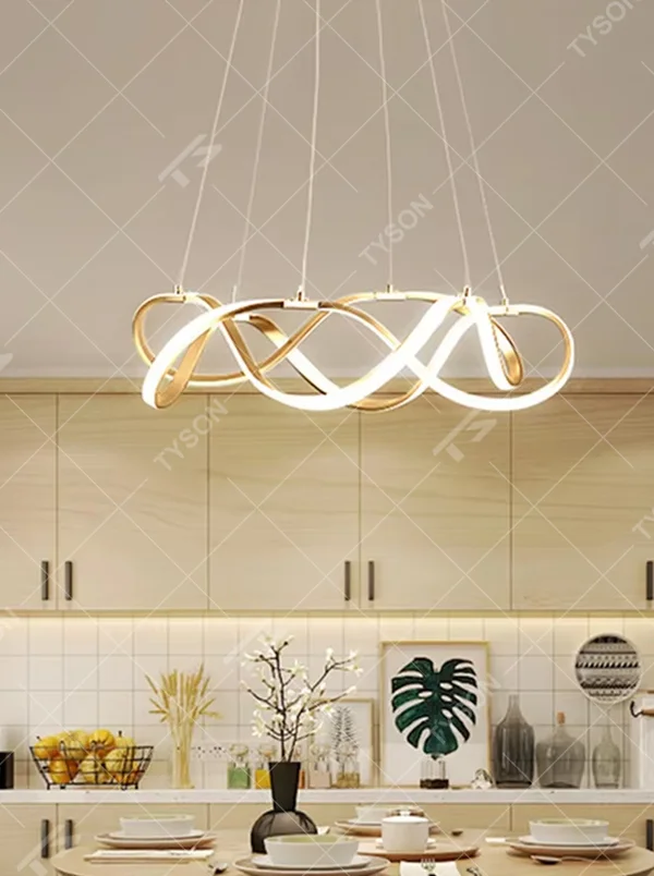 Modern art ribbon chandelier, featuring interwoven and flowing gold metal strips with built-in soft LED lighting. Its dynamic and layered lines combine artistry and ambiance, making it a high-end decorative lighting fixture that elevates the space's style.