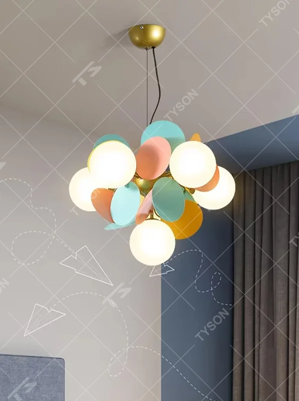 This playful and colorful linear disc chandelier features a gold metal frame, paired with milky white glowing spheres and macaron-colored (pink, orange, blue, yellow) decorative discs arranged in a fluffy cloud-like layout. When lit, it emits a soft and warm glow, creating a lively and comforting atmosphere. Ideal for kids' bedrooms, parent-child play areas, dining rooms, and other spaces, it adds a dreamy and romantic touch to childlike or modern minimalist environments.