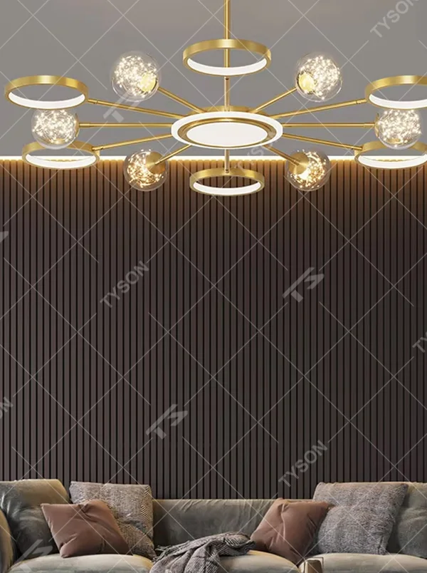 This modern light luxury radial chandelier features a gold metal frame with multiple radially extending arms, paired with glowing rings and glass ball lampshades with a starry sky effect. When lit, it emits a bright and soft glow, combining a futuristic feel with an ambient atmosphere. Ideal for living rooms, large apartments, and light luxury residences, it adds an exquisite and sophisticated touch to modern minimalist or light luxury home environments.
