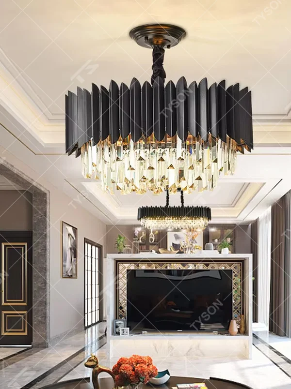 This modern light luxury two-layer chandelier features a dome shape enclosed by matte black vertical-textured metal on the upper layer, paired with transparent crystal tassel pendants on the lower layer, suspended by a black braided cord. When lit, light refracts through the crystal to emit a brilliant and soft glow, combining a sleek, bold texture with an elegant ambiance. Ideal for dining rooms, bedrooms, light luxury living rooms, and other spaces, it adds an exquisite and sophisticated touch to modern minimalist or industrial-style home environments.