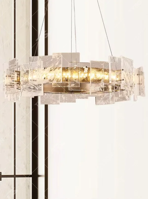 Modern light luxury ice crystal ring chandelier, featuring a gold metal frame paired with staggered ice-crystal textured acrylic panels. Light refracts through the panels to create a brilliant and soft glow, combining luxury texture and artistic ambiance, making it a high-end decorative lighting fixture that elevates the space's style.
