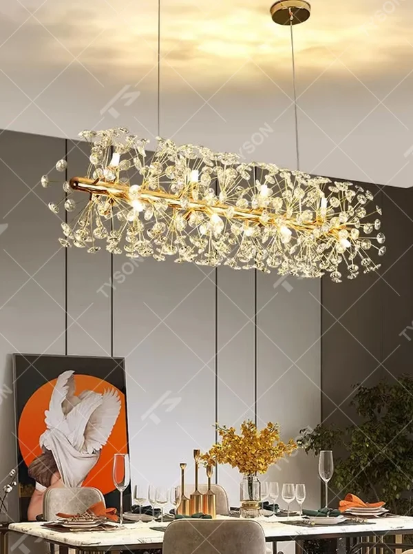 Modern light luxury starry sky oval crystal chandelier, featuring a gold metal frame covered with transparent crystal ornaments. Light refracts through the crystals to create a brilliant glow, combining luxury texture and artistic ambiance, making it a high-end decorative lighting fixture that elevates the space's style.