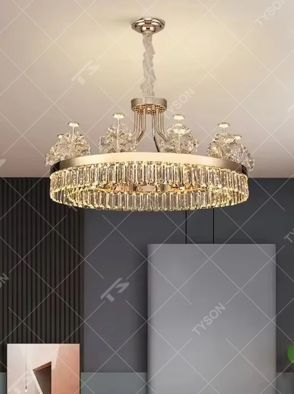 This modern light luxury two-layer crystal chandelier features a gold metal frame, with dense transparent long crystals hanging below and leaf-textured crystal lampshades on top. When lit, light refracts through the crystal to emit a brilliant and soft glow, combining an ethereal texture with an ambient atmosphere. Ideal for living rooms, dining rooms, light luxury apartments, and other spaces, it adds an exquisite and sophisticated touch to modern minimalist or light luxury home environments.