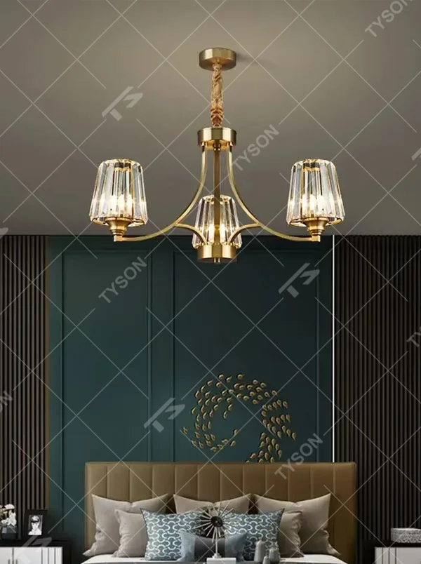 This modern light luxury multi-head chandelier features a champagne gold metal frame, with textured crystal lampshades forming an arc branch shape. When lit, light refracts through the crystals to emit a soft and brilliant glow, combining a retro-luxurious texture with an ambient atmosphere. Ideal for living rooms, dining rooms, light luxury apartments, and other spaces, it adds an exquisite and sophisticated touch to modern minimalist or light luxury home environments.